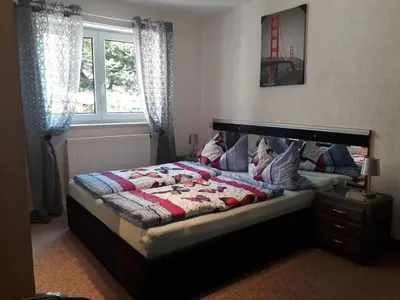 Ein Bett oder Betten in einem Zimmer der Unterkunft Ferienwohnung Suetovius