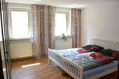 Ein Bett oder Betten in einem Zimmer der Unterkunft Direkt im Herzen von Bayreuth Wohnung S9 mit 115qm und großem Balkon