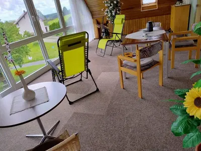 Ein Sitzbereich in der Unterkunft Ferienwohnung Heike Greiner