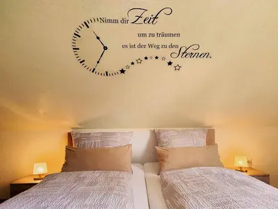 Ein Bett oder Betten in einem Zimmer der Unterkunft Ferienwohnung Heike Greiner
