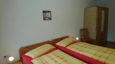 Ein Bett oder Betten in einem Zimmer der Unterkunft Ferienwohnungen Bauer