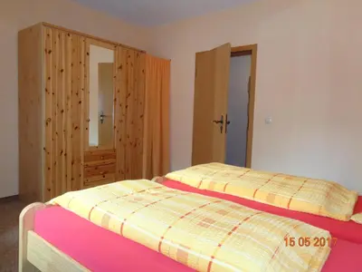 Ein Bett oder Betten in einem Zimmer der Unterkunft Ferienwohnungen Bauer
