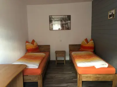 Ein Bett oder Betten in einem Zimmer der Unterkunft Gasthaus Riebel