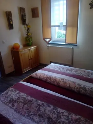 Ein Bett oder Betten in einem Zimmer der Unterkunft Gasthaus Riebel