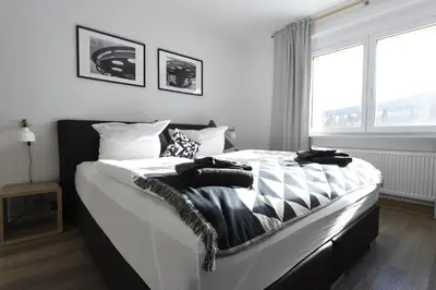 Ein Bett oder Betten in einem Zimmer der Unterkunft Oberwiesenthal Apartments