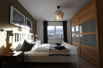 Ein Bett oder Betten in einem Zimmer der Unterkunft Oberwiesenthal Apartments