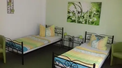 Ein Bett oder Betten in einem Zimmer der Unterkunft Ferienhaus Johanna & Ferienwohnung Thum