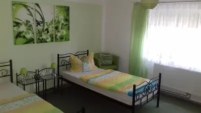 Ein Bett oder Betten in einem Zimmer der Unterkunft Ferienhaus Johanna & Ferienwohnung Thum