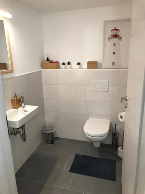 Ein Badezimmer in der Unterkunft Ferienwohnung „Frosch“