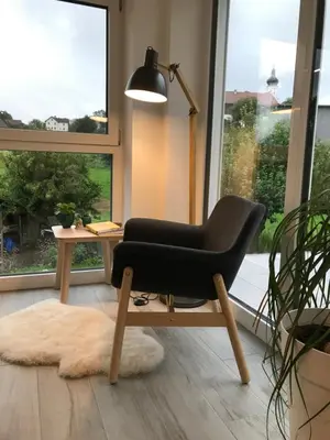 Ein Sitzbereich in der Unterkunft Ferienwohnung „Frosch“