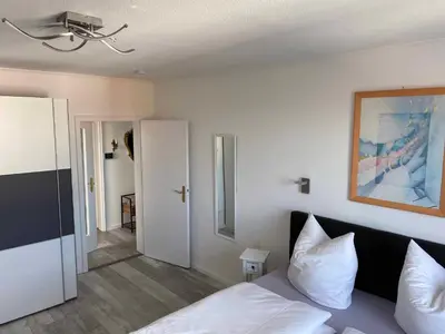 Ein Bett oder Betten in einem Zimmer der Unterkunft Ferienwohnung Nußmann