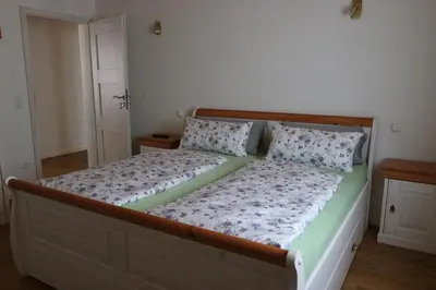 Ein Bett oder Betten in einem Zimmer der Unterkunft Ferienwohnung Bittner