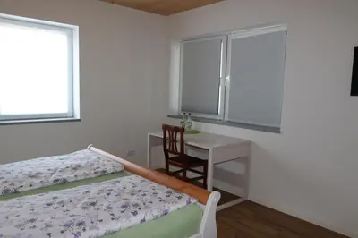 Ein Bett oder Betten in einem Zimmer der Unterkunft Ferienwohnung Bittner