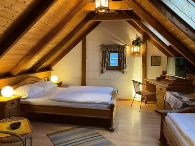 Ein Bett oder Betten in einem Zimmer der Unterkunft Landhotel Schwärzhof