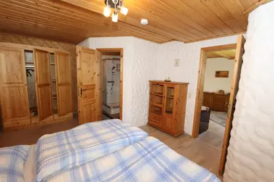 Ein Bett oder Betten in einem Zimmer der Unterkunft Haus Andrea