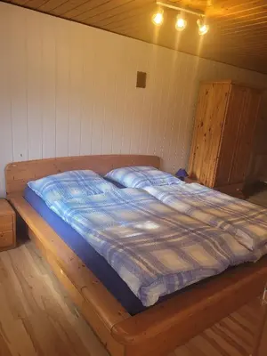 Ein Bett oder Betten in einem Zimmer der Unterkunft Haus Andrea