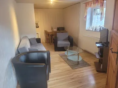 Ein Sitzbereich in der Unterkunft Haus Andrea