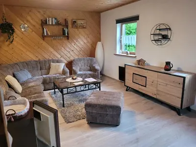 Ein Sitzbereich in der Unterkunft Haus Andrea