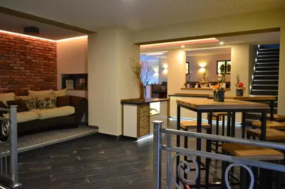 Ein Sitzbereich in der Unterkunft Hotel-Pension Vier Jahreszeiten