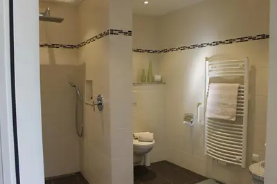 Ein Badezimmer in der Unterkunft Hotel Number One
