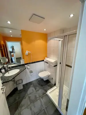 Ein Badezimmer in der Unterkunft Berggasthof Hotel Igelwirt