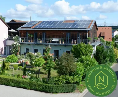 Ein Garten an der Unterkunft HOF ELF