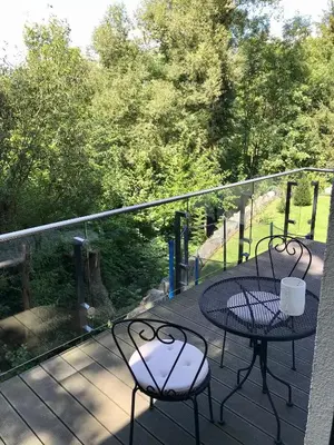 Ein Balkon oder eine Terrasse in der Unterkunft Ferienhaus am Park am Röhrensee