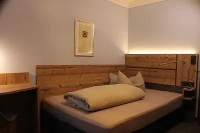 Ein Bett oder Betten in einem Zimmer der Unterkunft Gasthof Goldene Krone