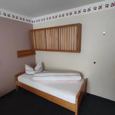 Ein Bett oder Betten in einem Zimmer der Unterkunft Gasthof Goldene Krone