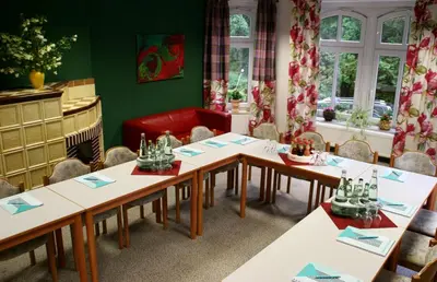 Ein Sitzbereich in der Unterkunft Parkhotel Helene