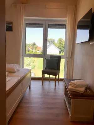 Ein Bett oder Betten in einem Zimmer der Unterkunft Ferienwohnungen Familie Mapenzi