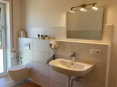 Ein Badezimmer in der Unterkunft Ferienwohnungen Familie Mapenzi