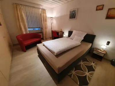 Ein Bett oder Betten in einem Zimmer der Unterkunft Gästehaus Aurelia