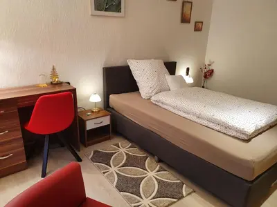 Ein Bett oder Betten in einem Zimmer der Unterkunft Gästehaus Aurelia