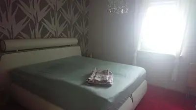 Ein Bett oder Betten in einem Zimmer der Unterkunft FeWo Erika