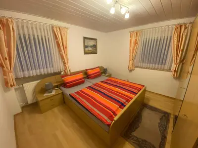 Ein Bett oder Betten in einem Zimmer der Unterkunft Gästehaus Frankenhof