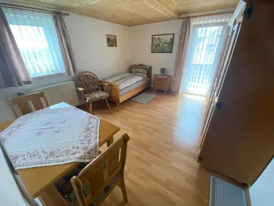 Ein Bett oder Betten in einem Zimmer der Unterkunft Gästehaus Frankenhof