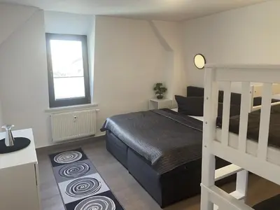 Ein Bett oder Betten in einem Zimmer der Unterkunft Fewos4seasons