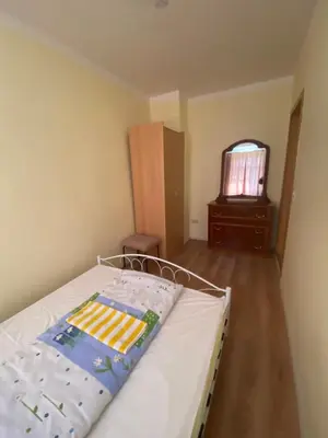 Ein Bett oder Betten in einem Zimmer der Unterkunft Ferienwohnung Goldener Drache
