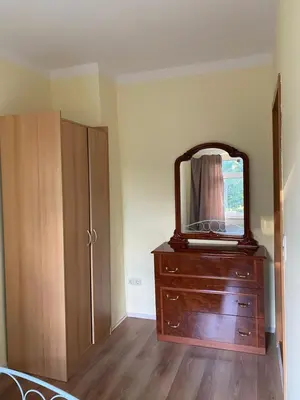 Ein Bett oder Betten in einem Zimmer der Unterkunft Ferienwohnung Goldener Drache