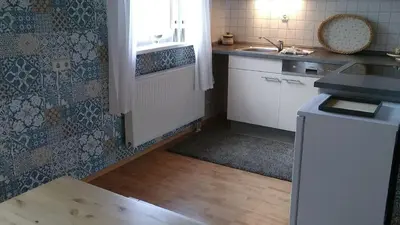 Küche/Küchenzeile in der Unterkunft Ferienwohnung Steinwald Ausläufer mit Blick auf Kösseine