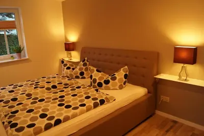 Ein Bett oder Betten in einem Zimmer der Unterkunft Gute Laune Hof Klingenthal