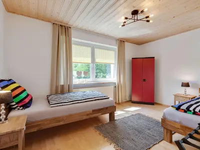 Ein Bett oder Betten in einem Zimmer der Unterkunft Feriendomizil Fichtelherz