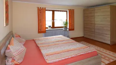 Ein Bett oder Betten in einem Zimmer der Unterkunft Ferienwohnung Bierl