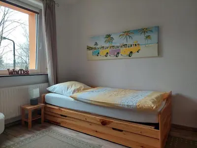 Ein Bett oder Betten in einem Zimmer der Unterkunft Ferienwohnung Beate Oberwiesenthal - 70qm - ideal für Familien und Paare - 2 Schlafzimmer - große Wohnküche - Parkplatz