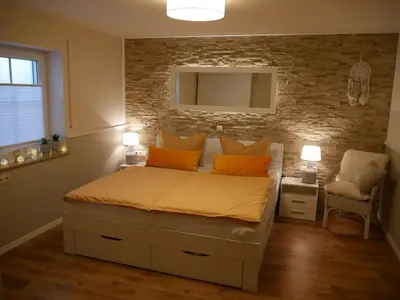 Ein Bett oder Betten in einem Zimmer der Unterkunft Haus Alexandra