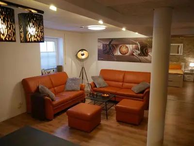 Ein Sitzbereich in der Unterkunft Haus Alexandra