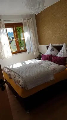 Ein Bett oder Betten in einem Zimmer der Unterkunft Ferienwohnung Heike Strobel