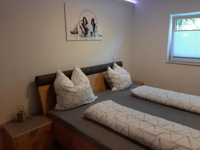 Ein Bett oder Betten in einem Zimmer der Unterkunft Ferienwohnung Jurastein