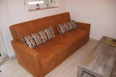 Ein Sitzbereich in der Unterkunft Ferienwohnung Jurastein